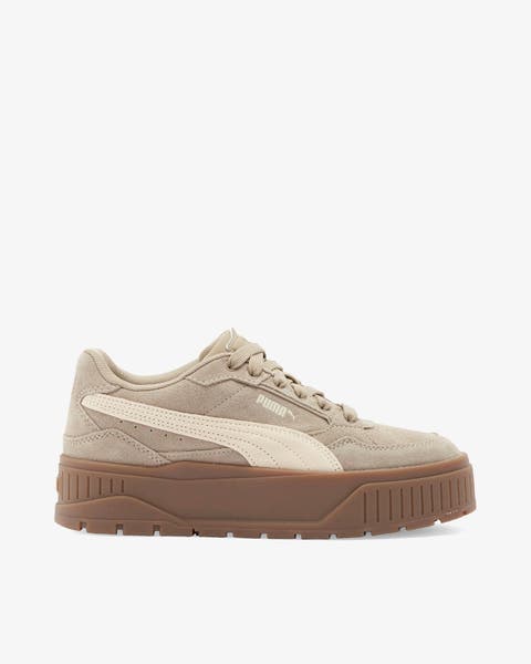 A tan adidas platform sneaker.