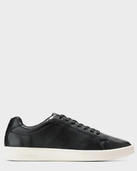 A men’s black sneaker.