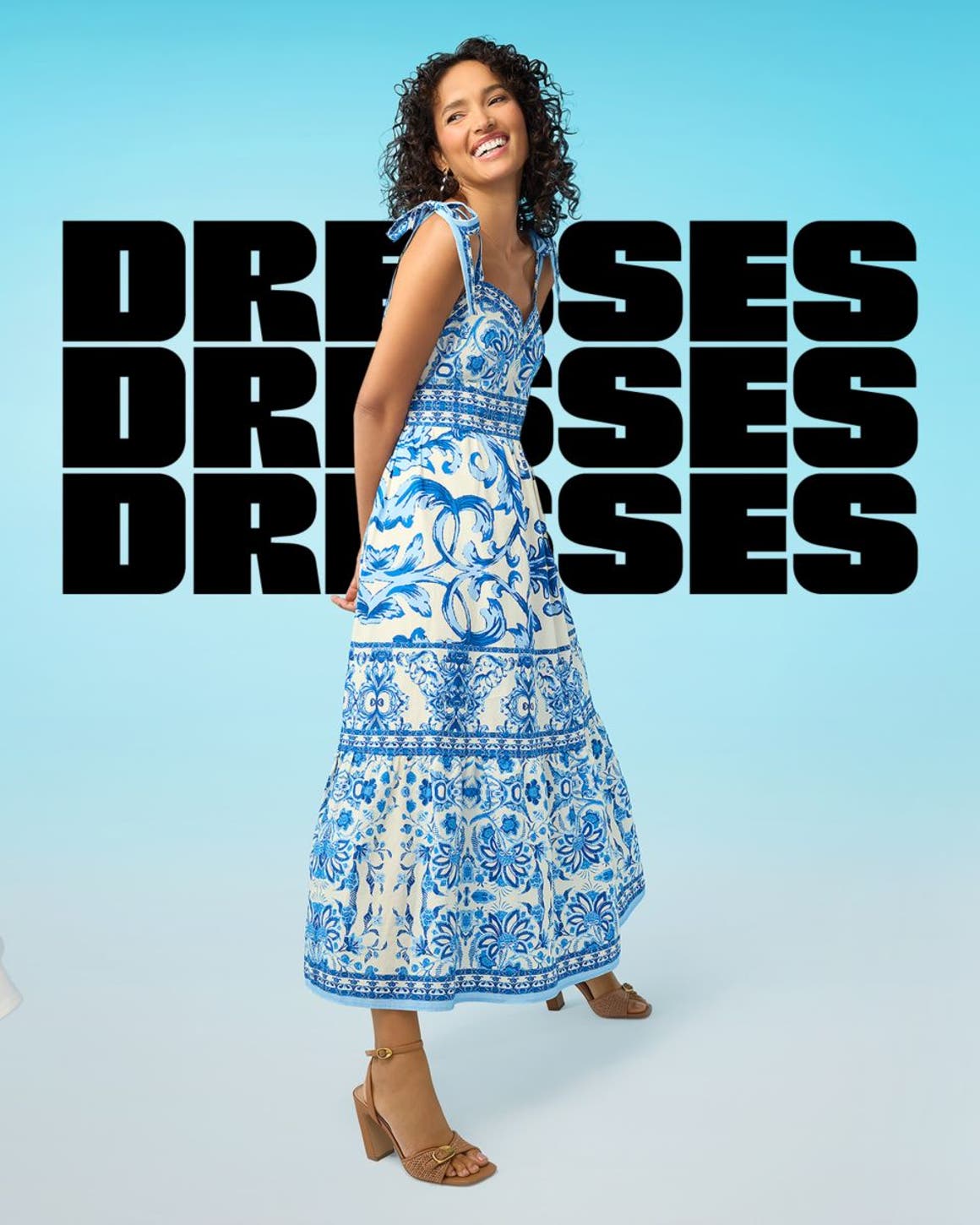 Models wearing spring dresses.