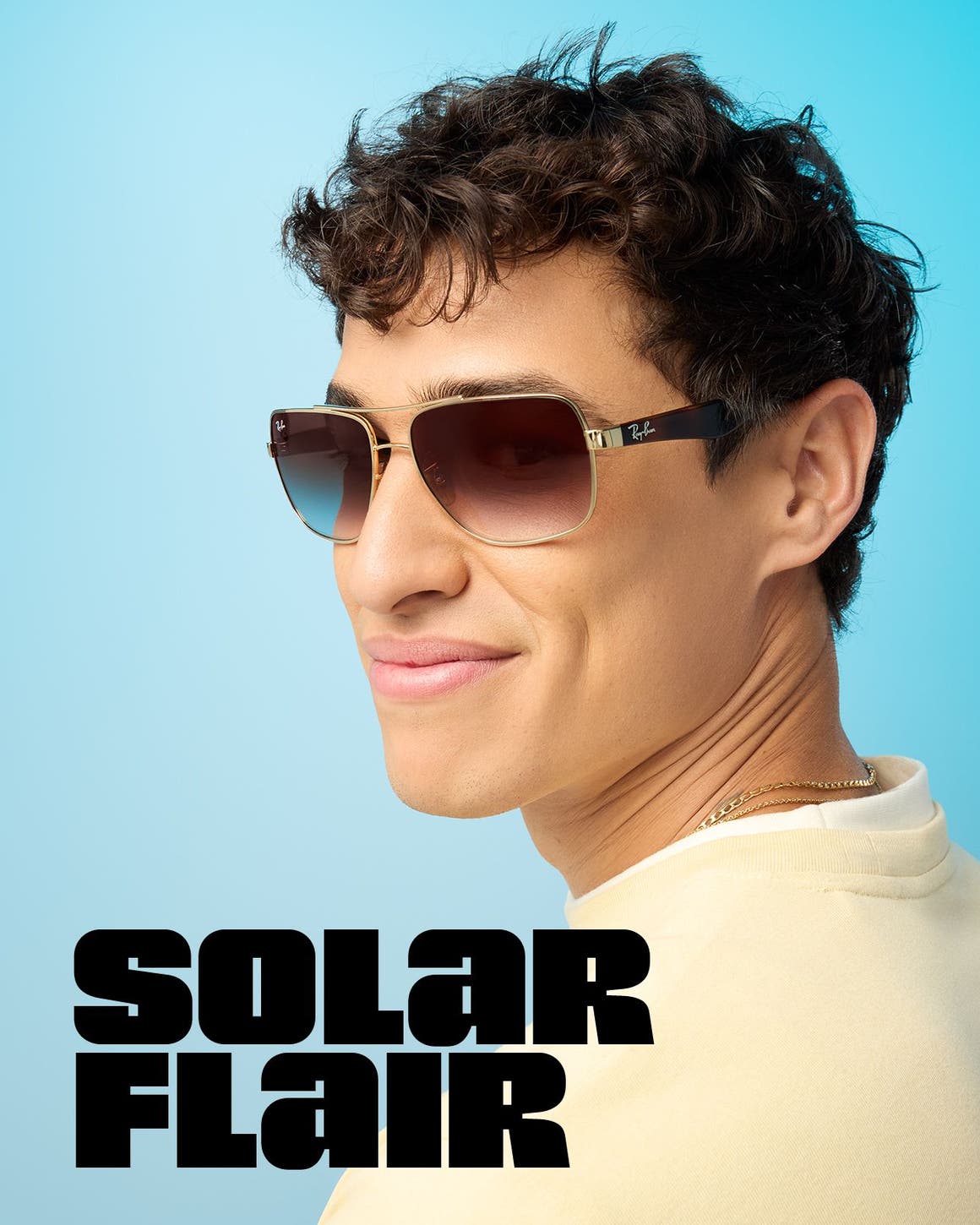 A man wearing aviator-style sunglasses.