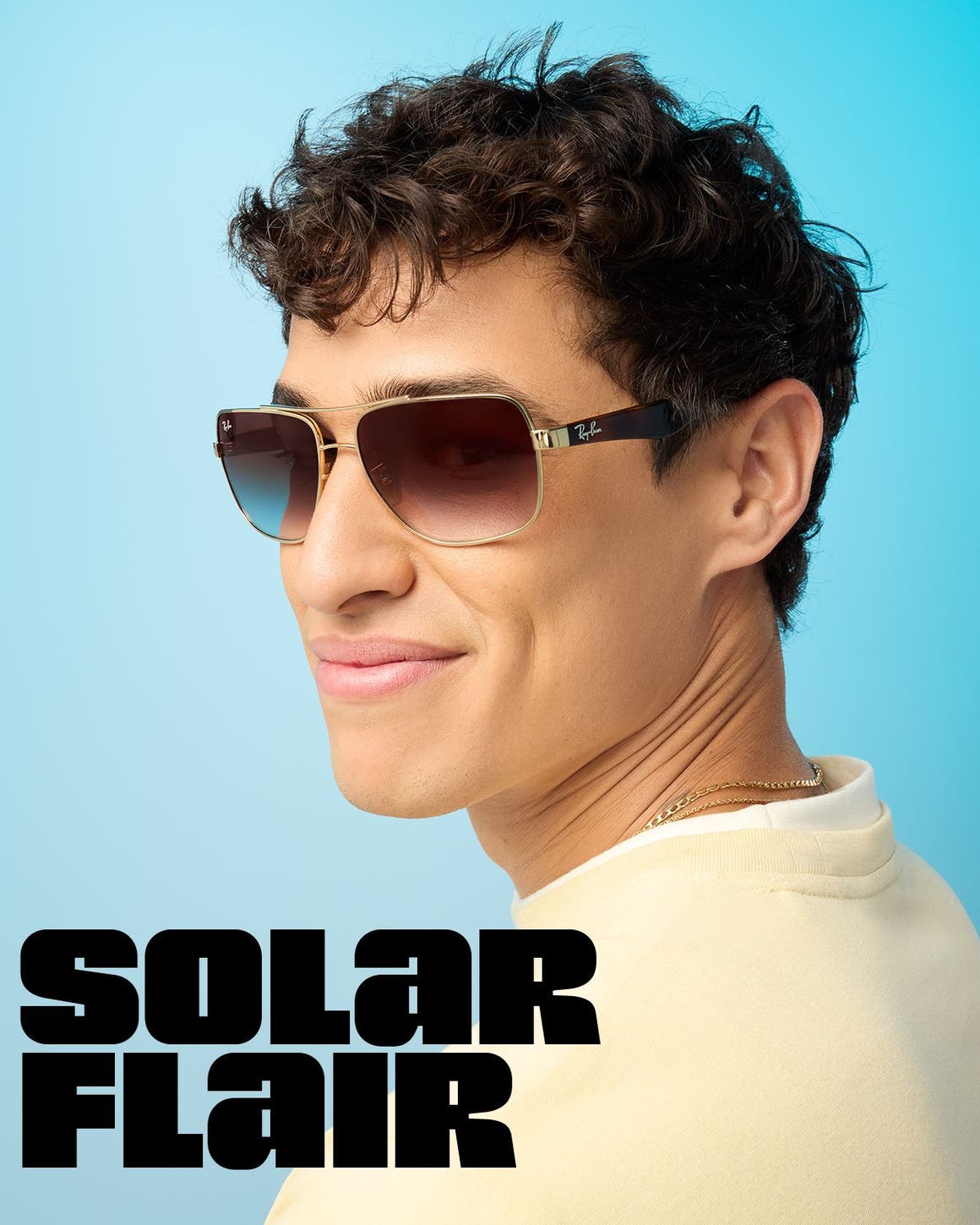 A man wearing aviator-style sunglasses.