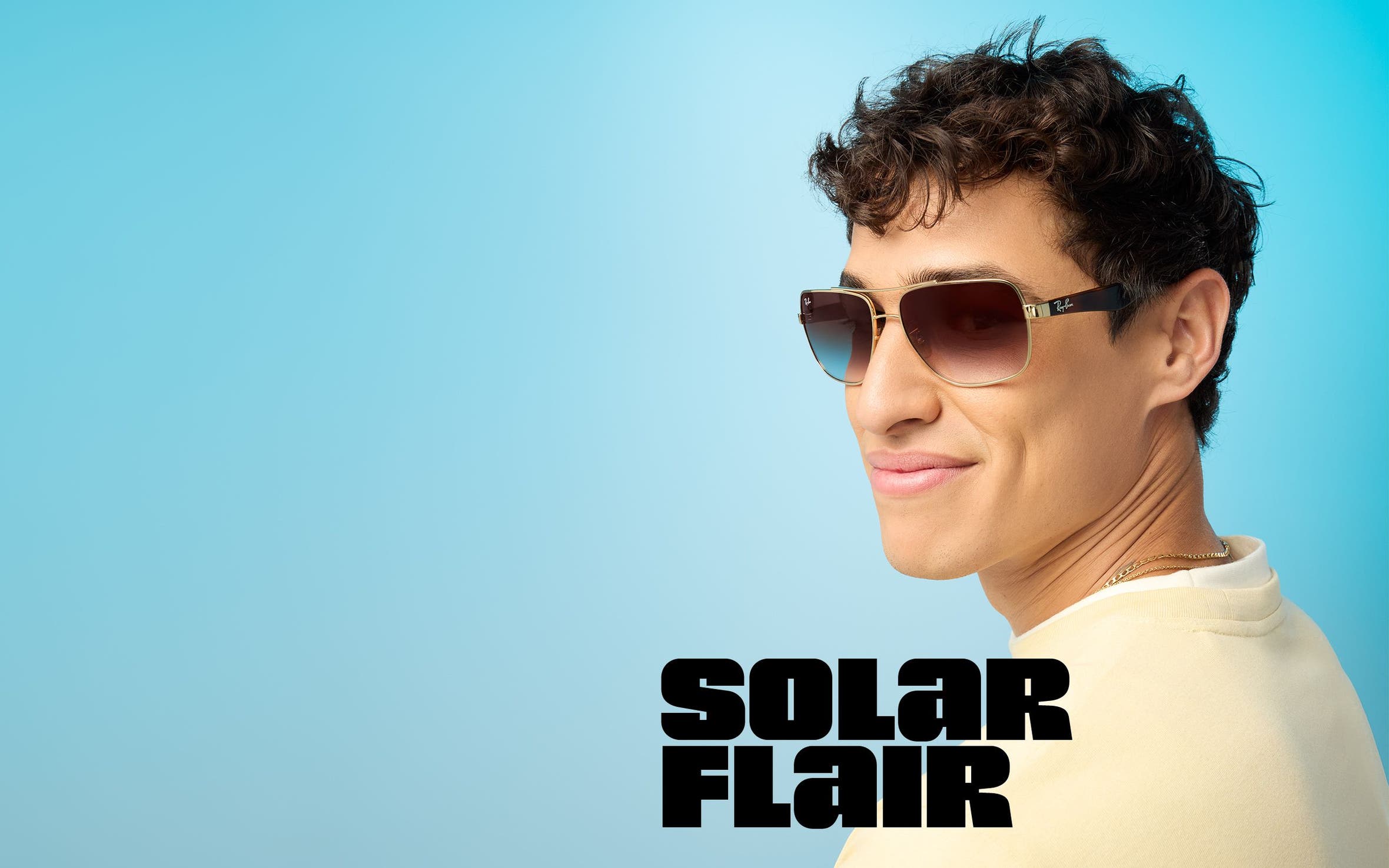 A man wearing aviator-style sunglasses.