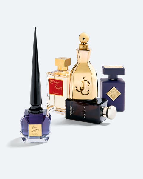 Five fragrance bottles. 