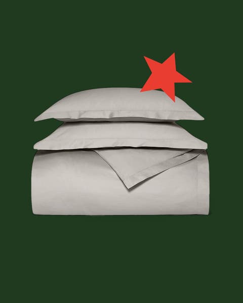 Grey sheets and pillowcases.