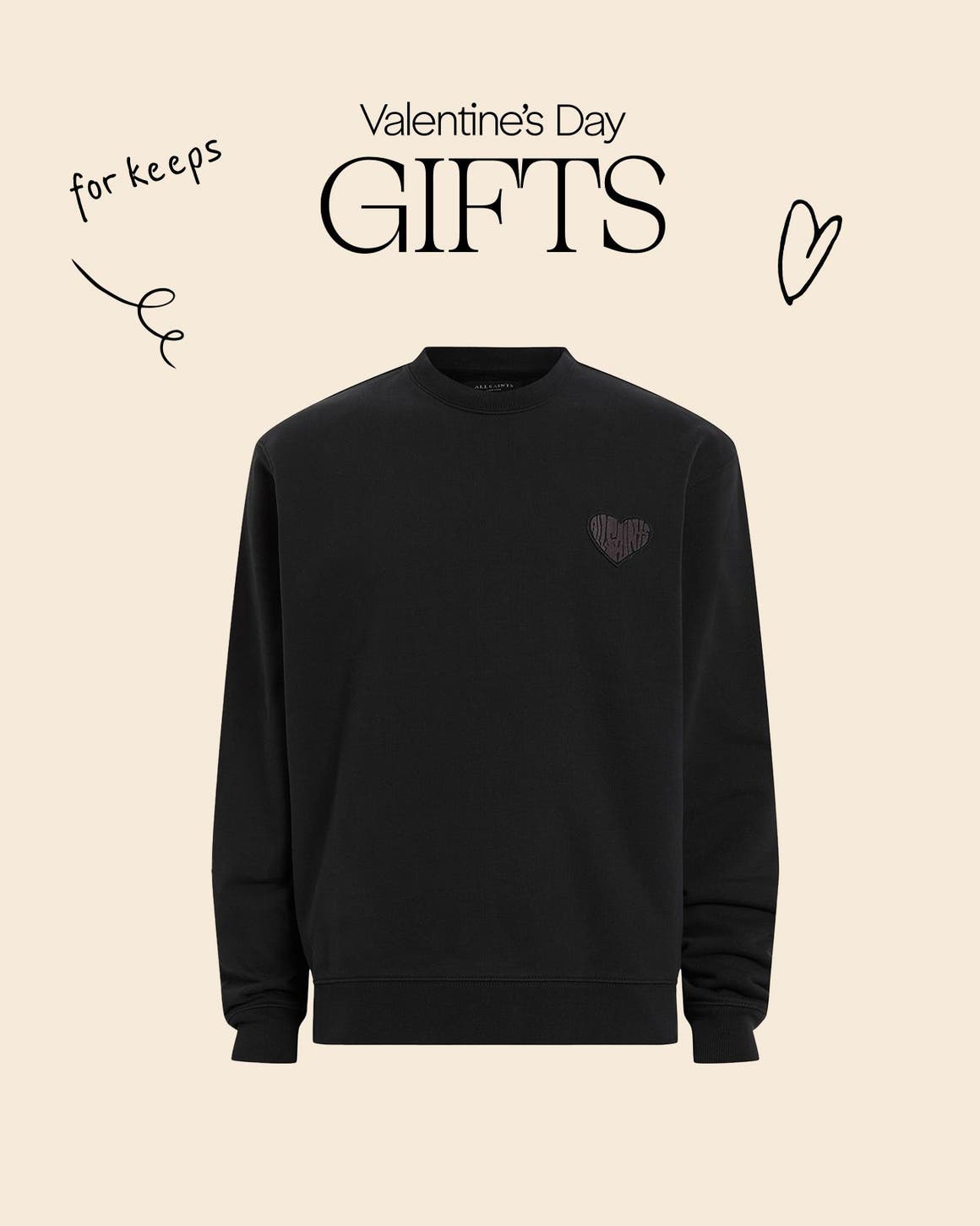 A black sweatshirt with a heart detail. 
