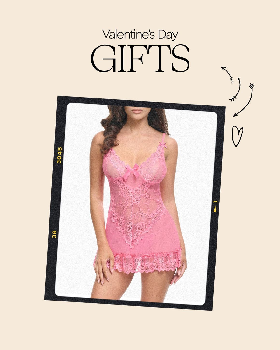 A woman wearing a pink lace chemise. 