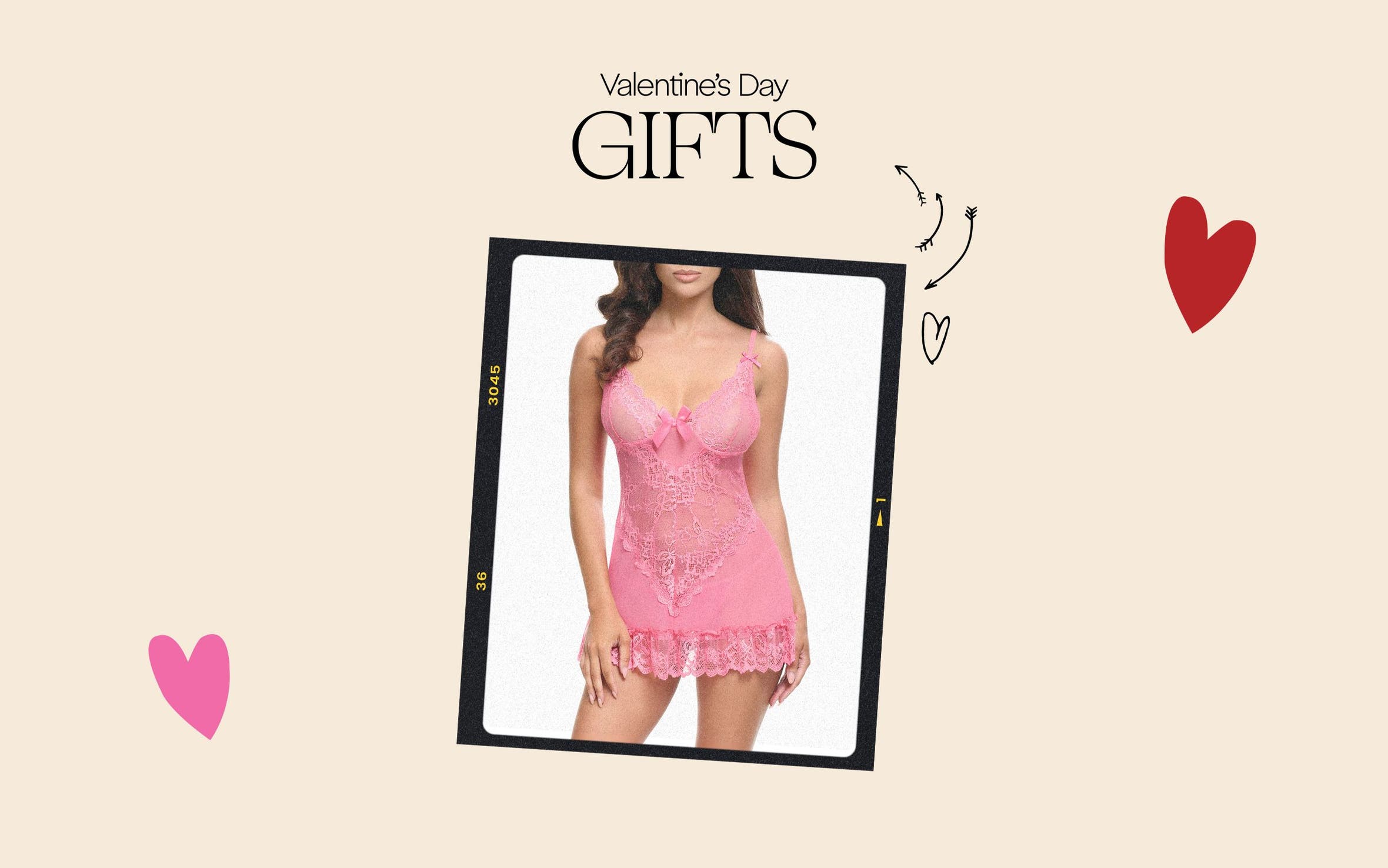 A woman wearing a pink lace chemise. 