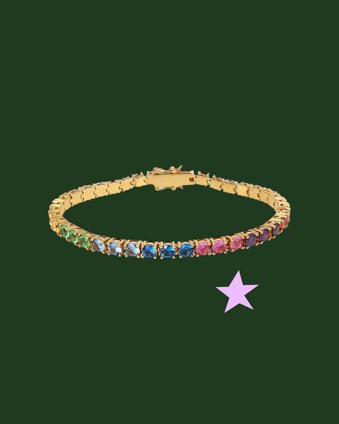A gold bracelet with colorful stones.