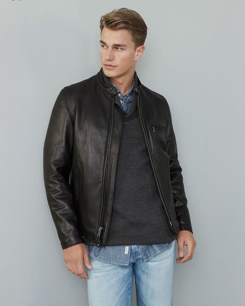 A man wearing a leather jacket.
