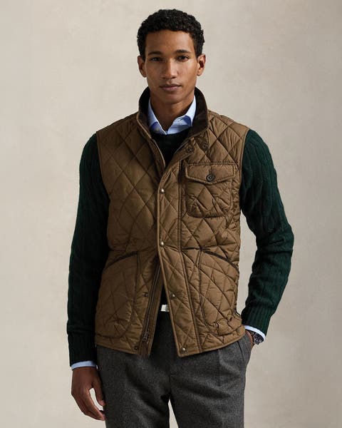 A man wearing a quilted vest.