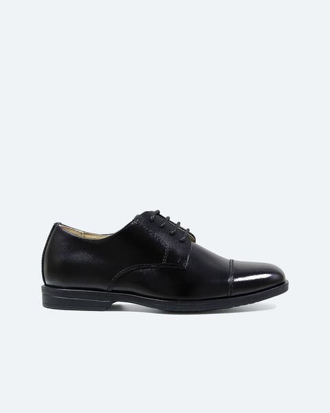 Black leather oxford dress shoe.
