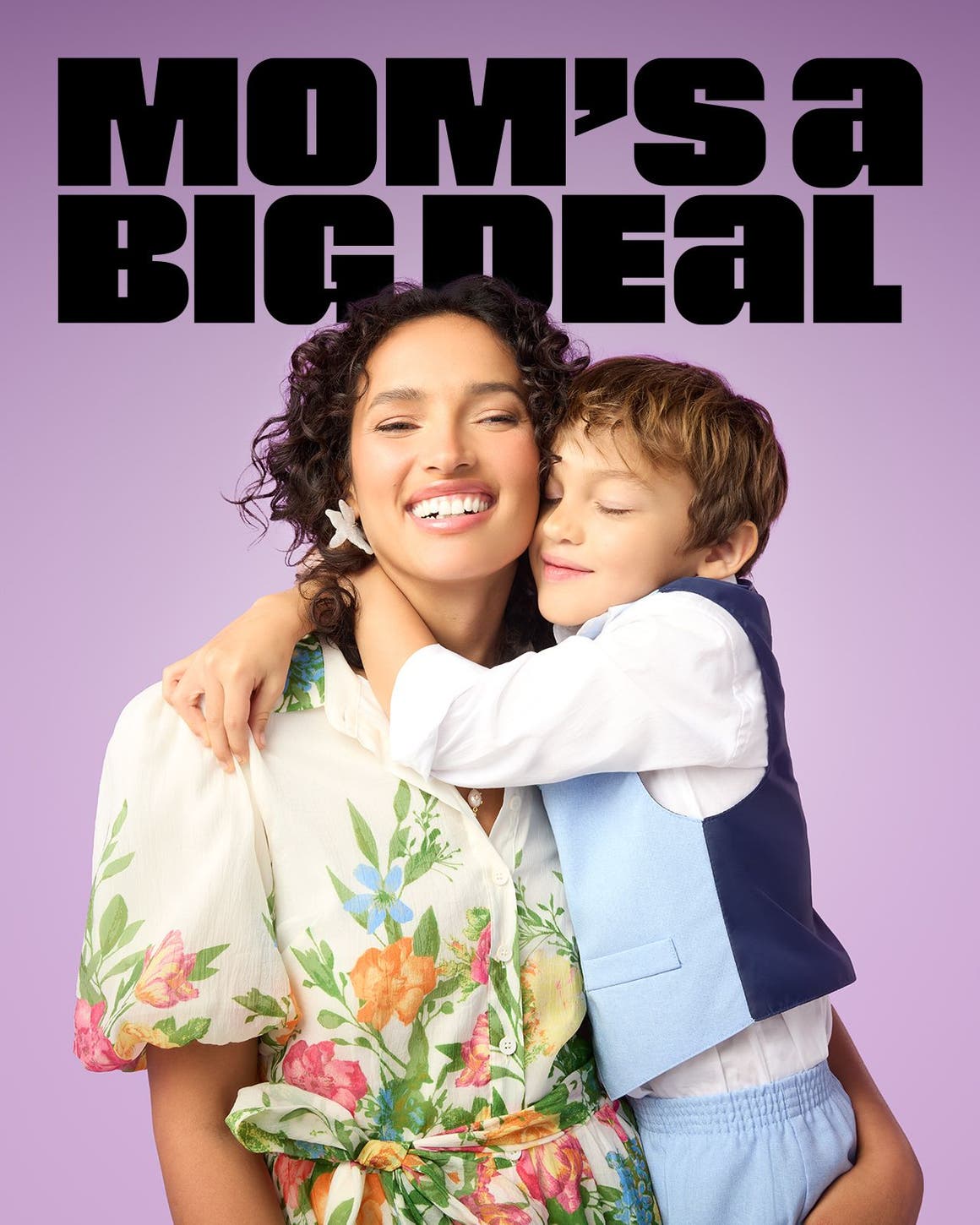 Mom’s a big deal. A woman and young boy hug.