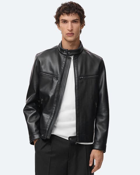 A man wearing a leather jacket.