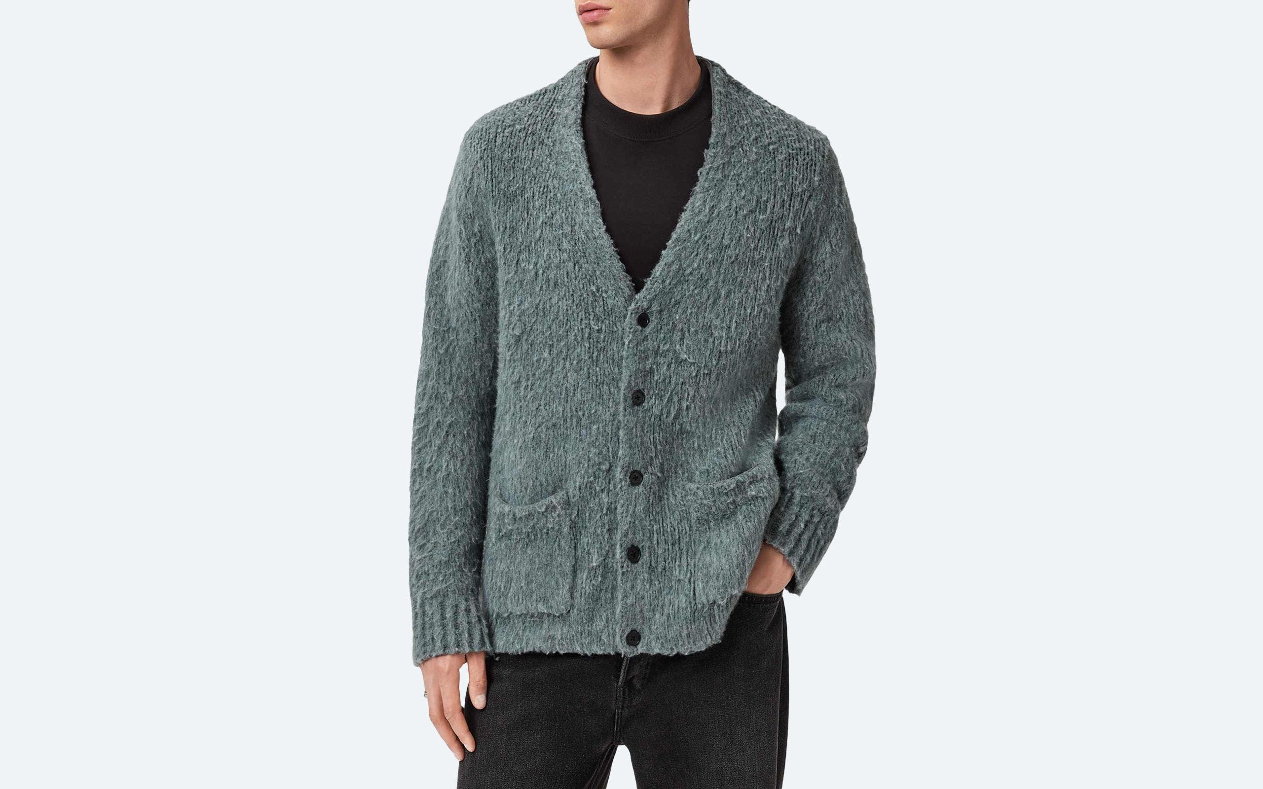 A man wearing a cardigan sweater.