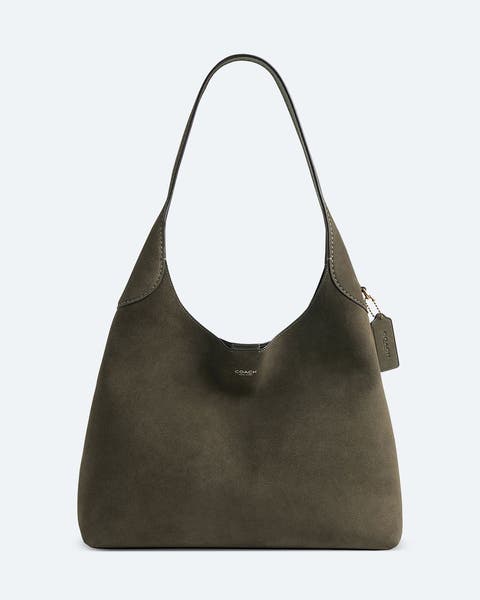 An olive-green suede shoulder bag.