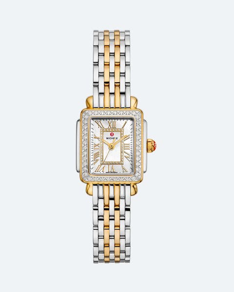 A silver and gold MICHELE watch with a diamond-framed face.