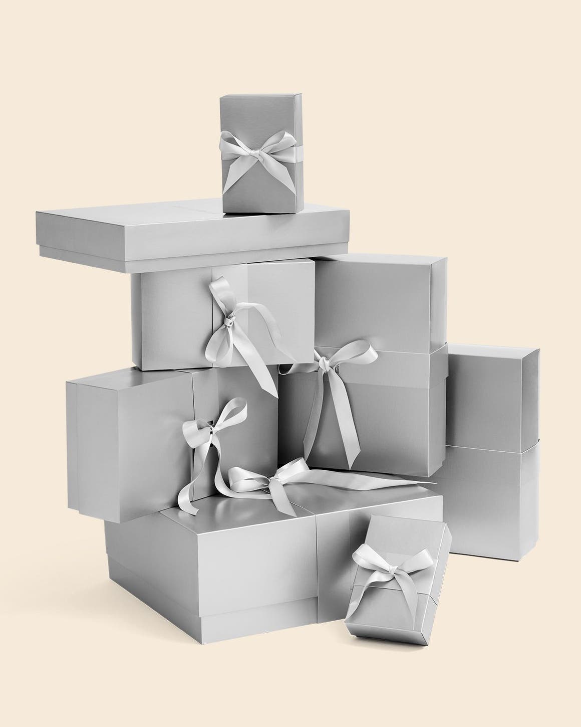 A stack of silver Nordstrom gift boxes. 