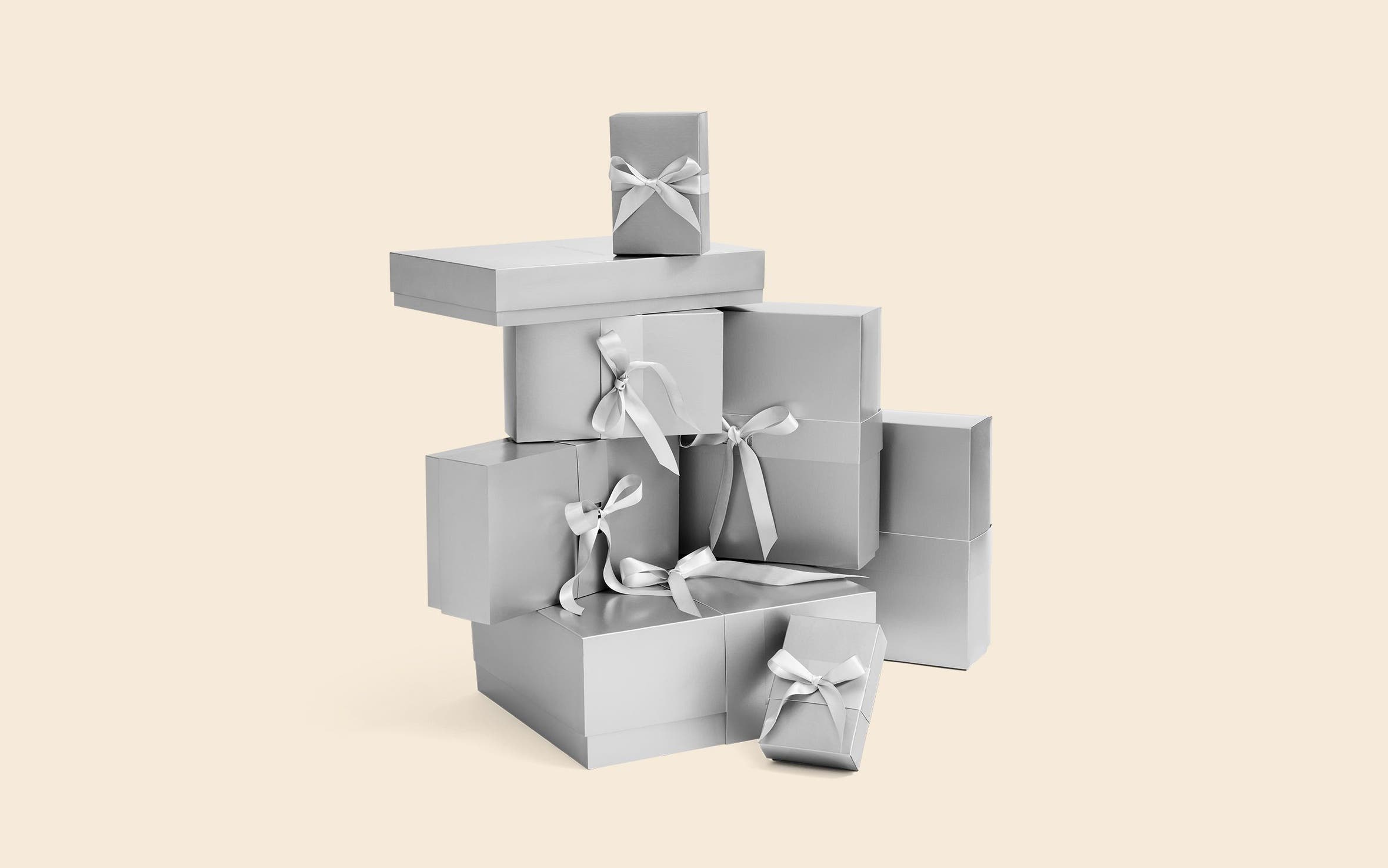 A stack of silver Nordstrom gift boxes. 