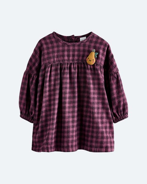 Little girls' check flannel dress with pear applique.