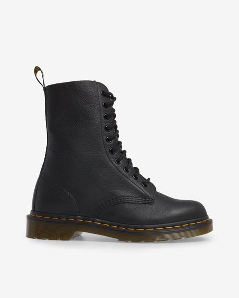 A black combat boot.