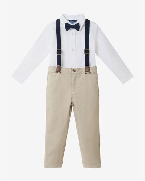 A boys’ white shirt with navy bow tie and suspenders, khaki pants.
