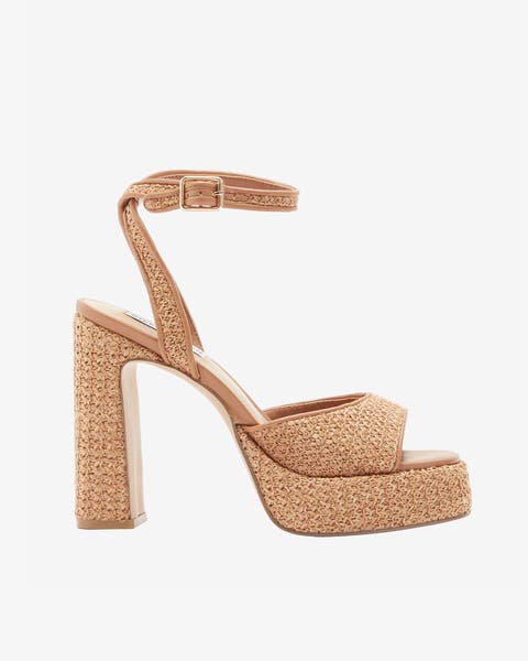 Tan woven raffia platform heel with ankle strap.