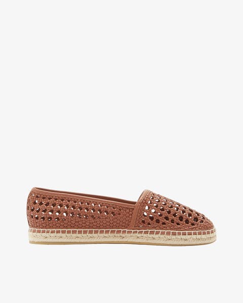 A tan woven espadrille flat.