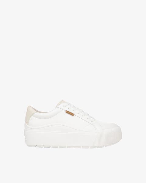 White platform lace-up sneaker with cream heel accent.