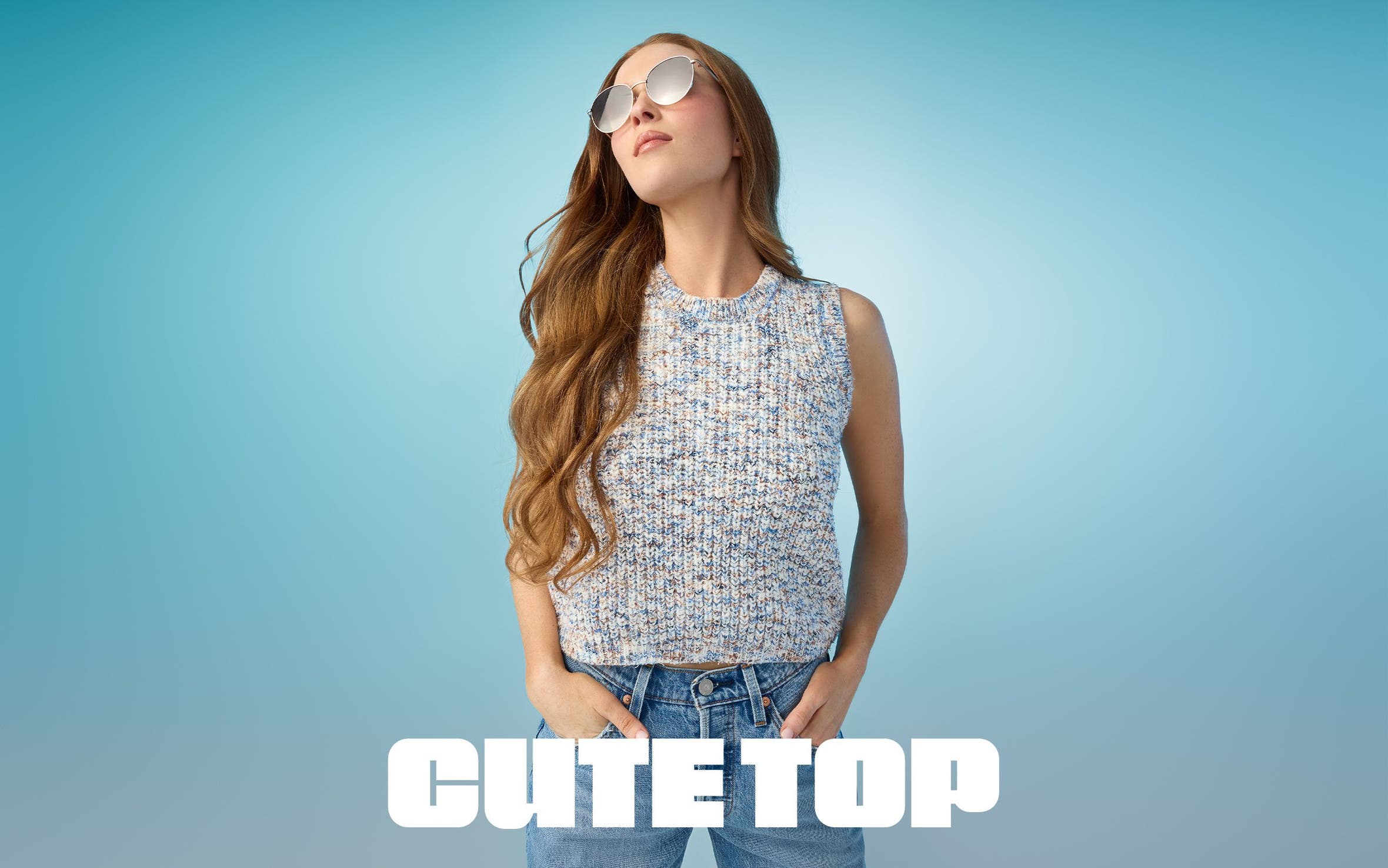 Model wearing a sleeveless textured knit top with jeans and tinted sunglasses.