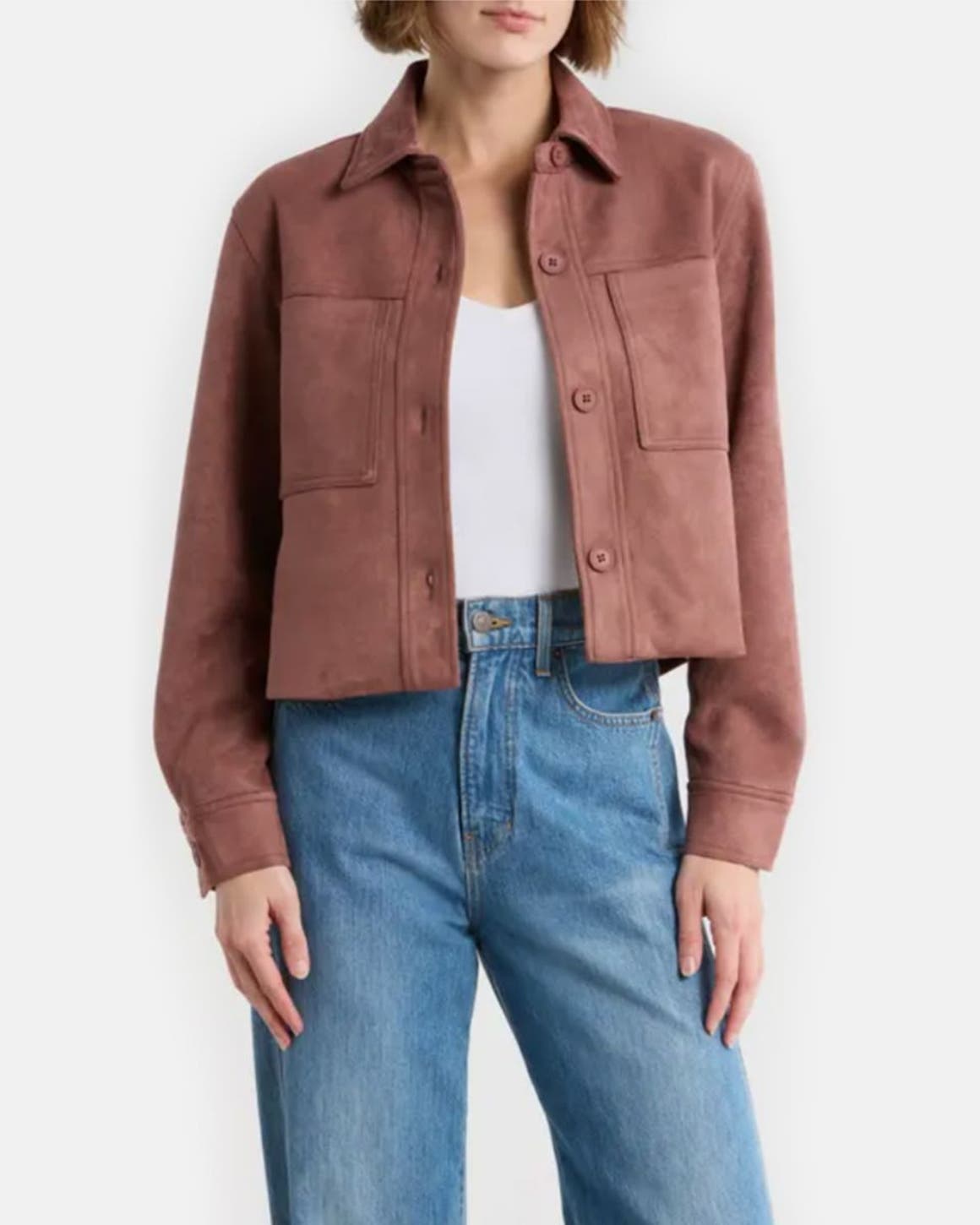Buy Now Wear Now. A suede jacket, Michele watch, Birkenstock sandals, and wide-leg jeans.