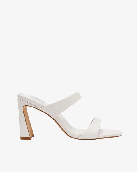 White block heel with open toe.