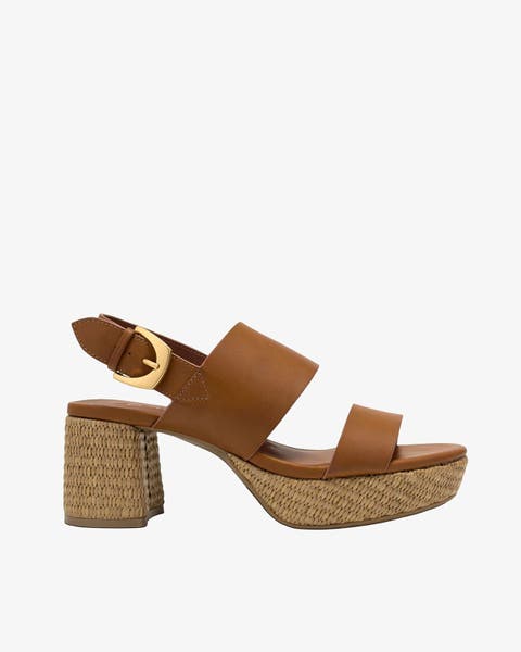 Brown chunky heel with open toe.