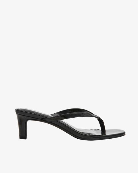 Flip-flop sandal with low heel.