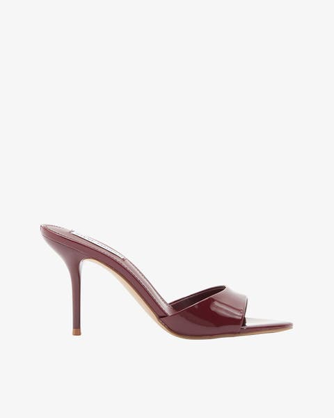 Brown high heel with open toe.