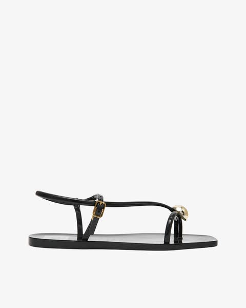 A strappy black sandal.