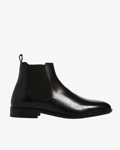 A men's black boot.