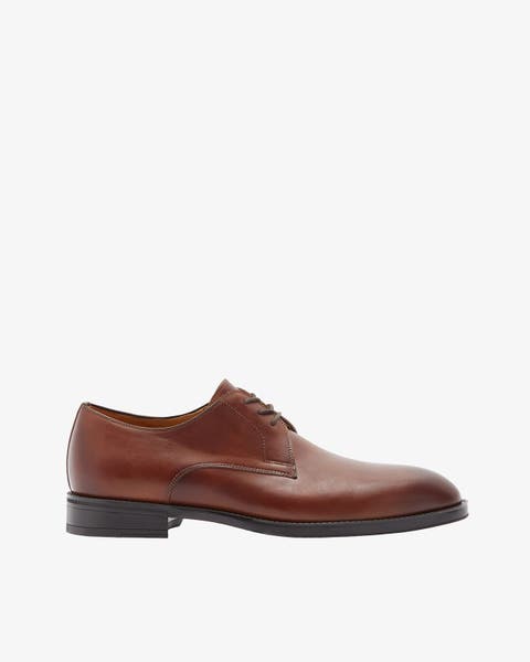 Men's brown dress shoe.