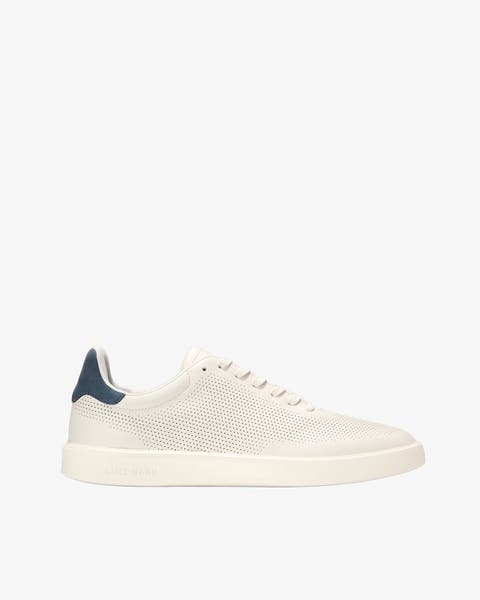 A men's white sneaker.