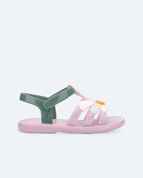 Daisy-patterned ankle-strap sandals.