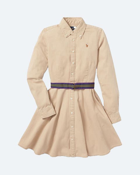 A tan shirtdress with a striped ribbon belt.