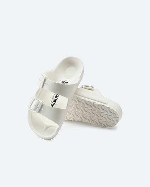 White, waterproof Birkenstock sandals.