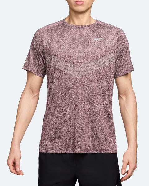 A man wearing a Nike athletic T-shirt.