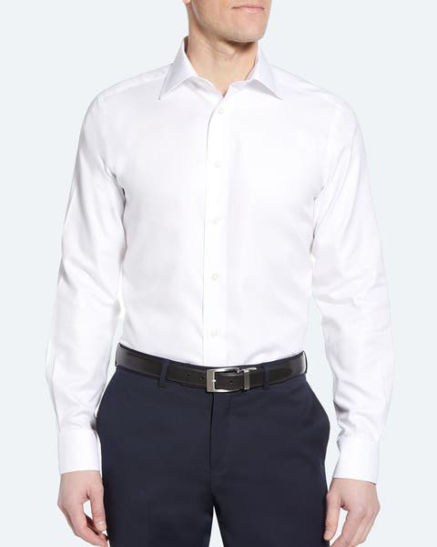 A man wearing a white dress shirt.