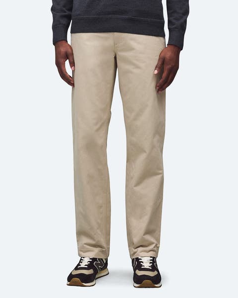 A man wearing khaki pants.