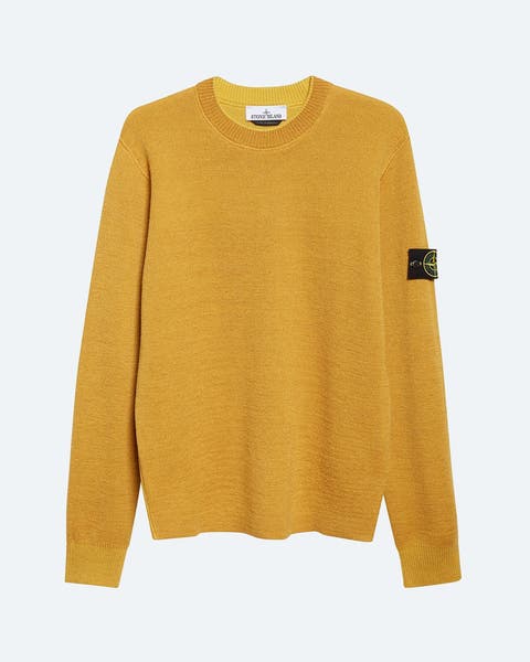 A yellow crewneck sweater.