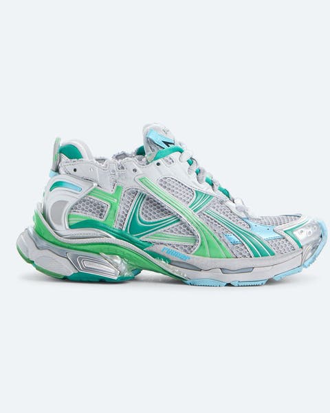 Green and white Balenciaga sneakers.