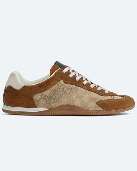 Logo-patterned Gucci sneakers.