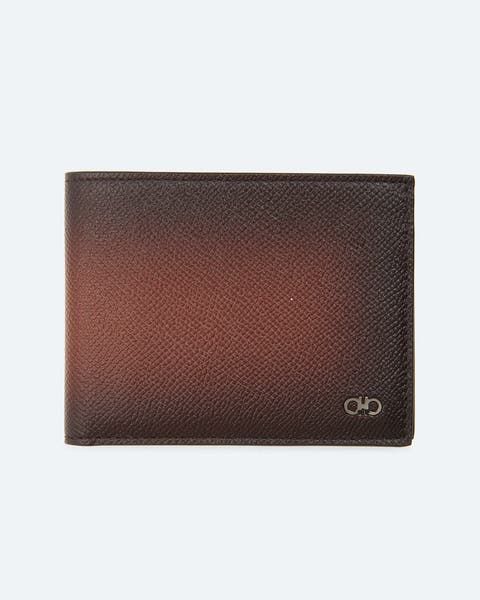 A burnished brown leather wallet.