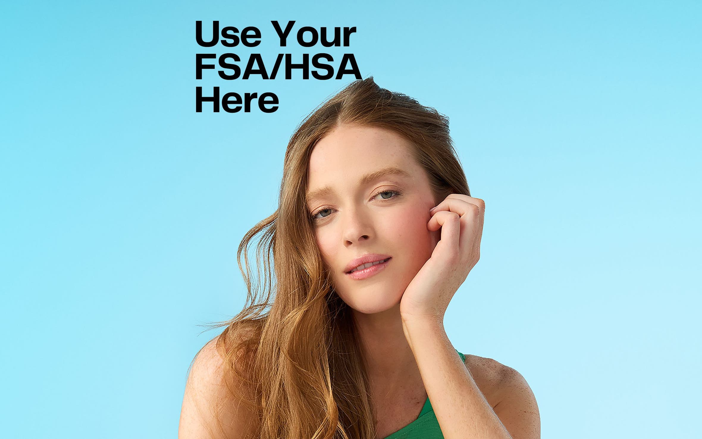 A woman with minimal makeup and wavy hair.