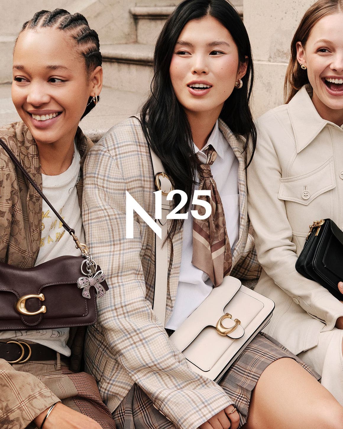 Women carrying COACH Tabby bags in different colors.